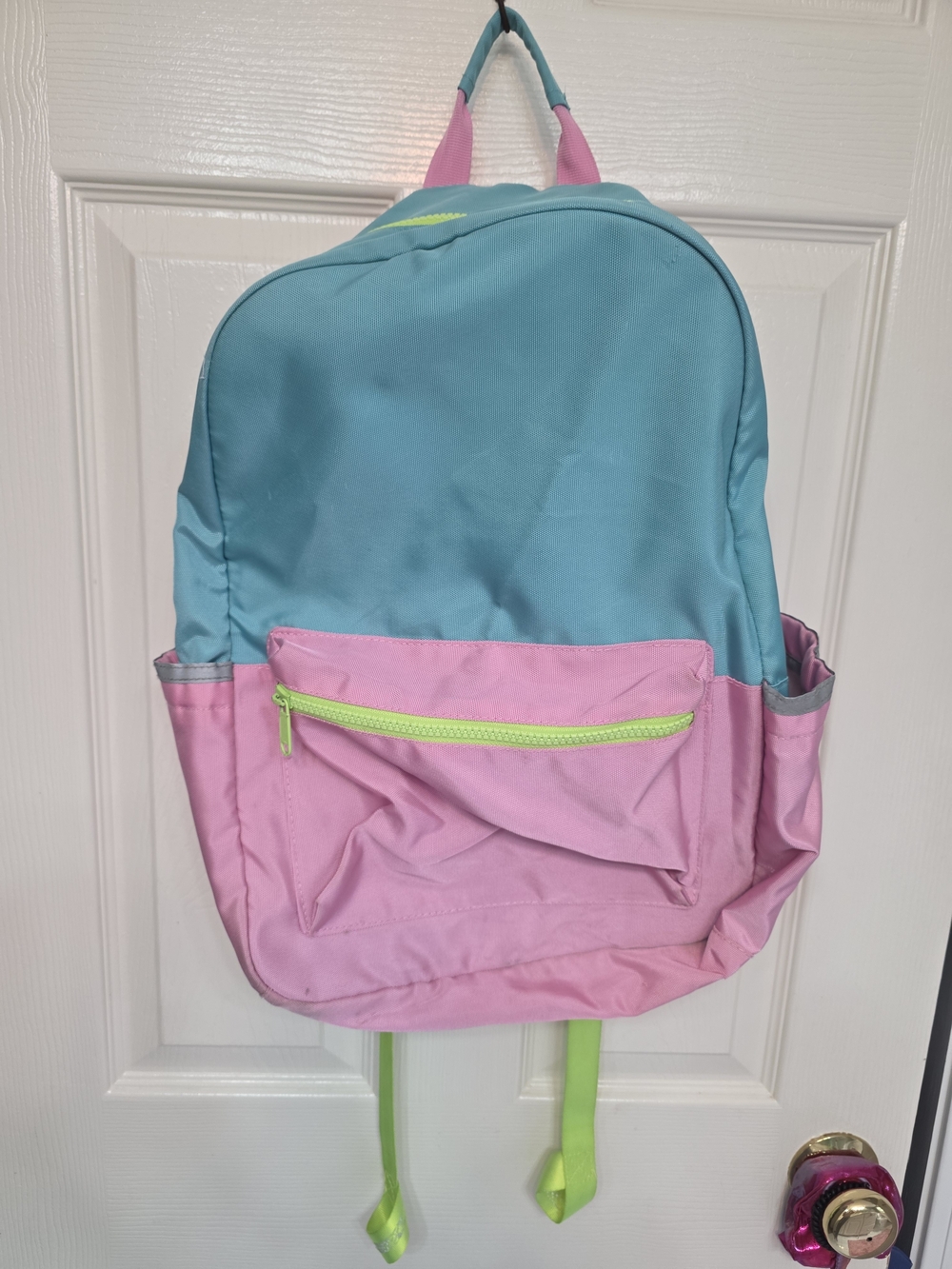 Pottery Barn Kids Astor Backpack featuring pink, aqua, and lime green colors.